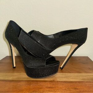 Lucho Black Platform Heels